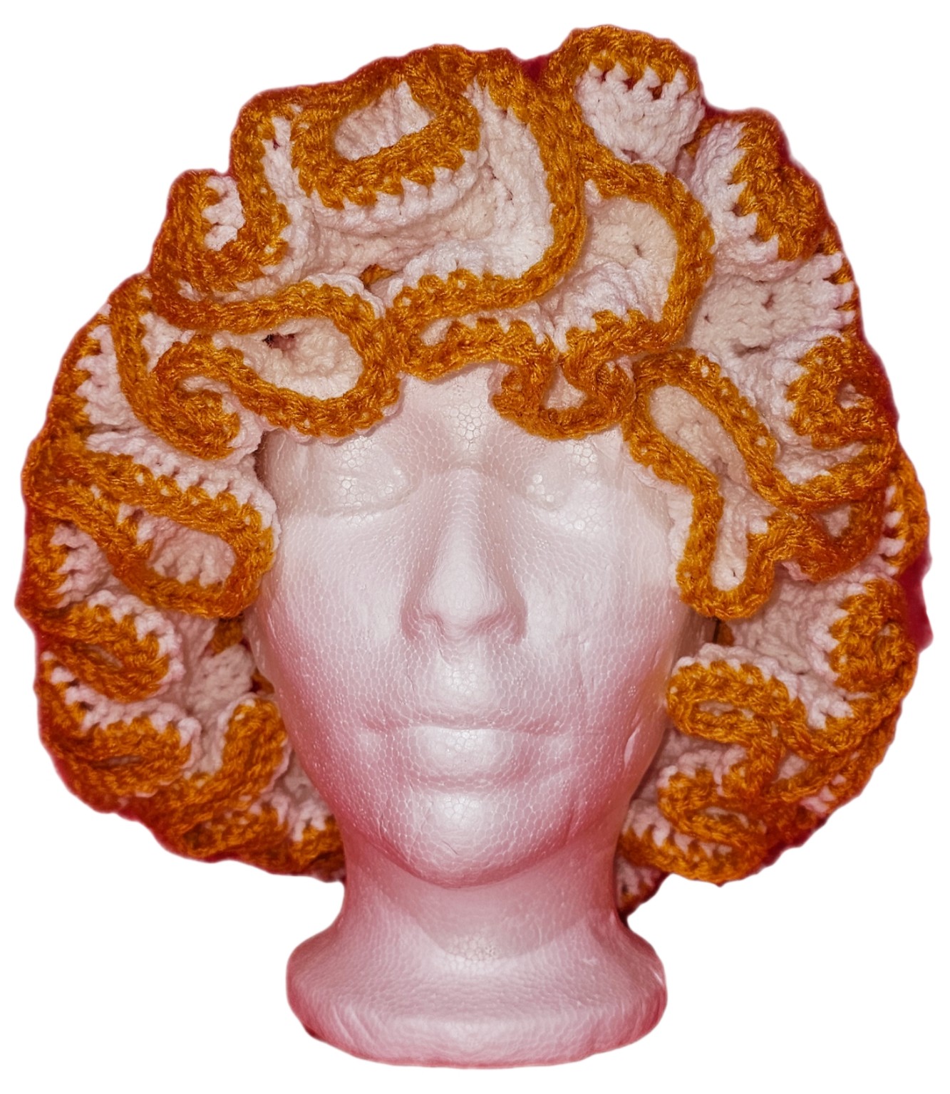 Gold and white crochet hat with a large sculptural ruffled brim, front view